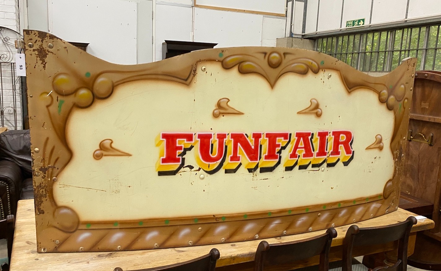 An enamel funfair panel, width 170cm, height 76cm